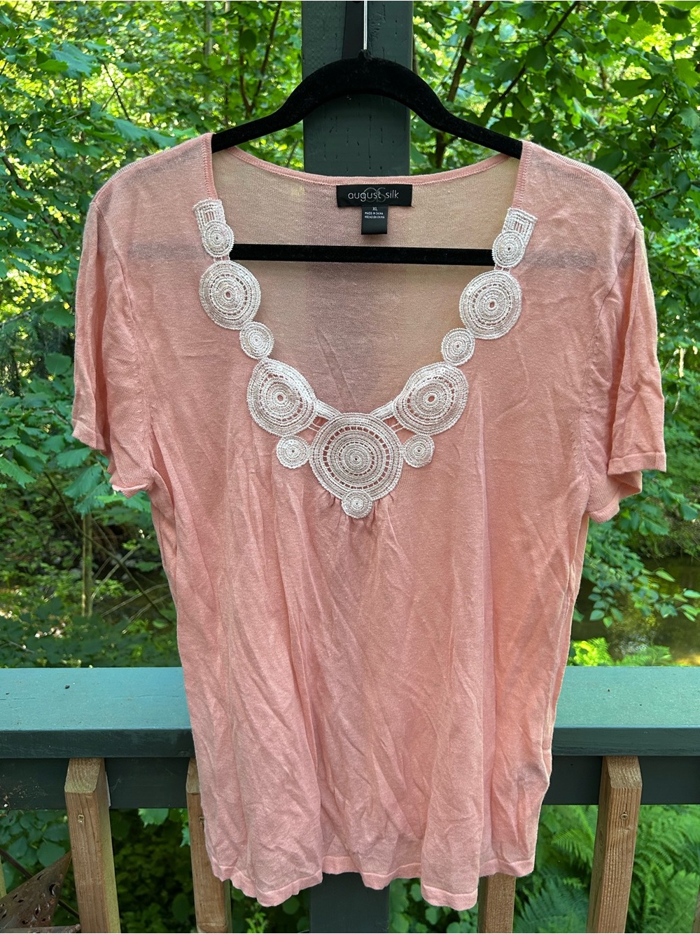 august silk peach tee with white lace medallion
